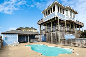 Rear exterior with private saltwater pool & bubbly hot tub!