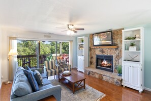 Open Living & Dining Areas with Balcony Access