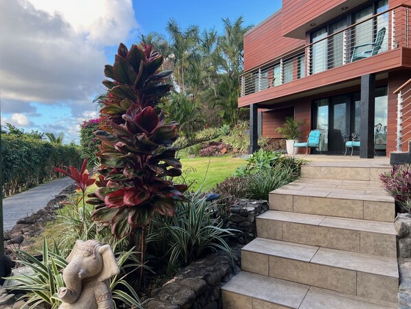 front entry, leading up to studio on the lower level and stairs to main floor.