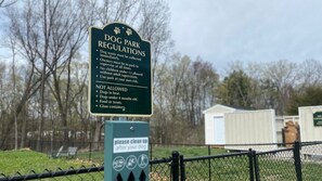 Small, private dog park on community grounds.