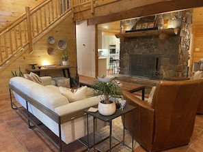 Main Living Area with Kitchen in the Background. 