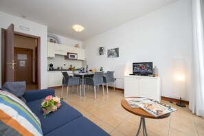 Living room with open plan kitchen