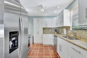 Out Kitchen Features a Newly Renovated Kitchen With Stainless Appliances