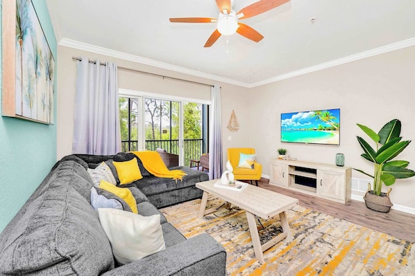 Living room with smart TV and patio access