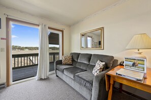 Enjoy gorgeous Views of Eel Creek right from the sofa!