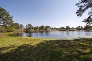 Barefoot Breeze sits on the edge of a serene Pond.