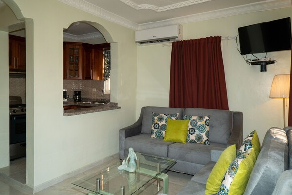 Furniture, Indoors, Living Room, Couch, Screen
