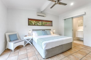 The master benefits from an ensuite is flooded in natural light, offering a comfortable night sleep in the king bed with air conditioning and a ceiling fan.