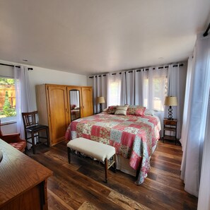 Master Bedroom - King bed with lakefront view.