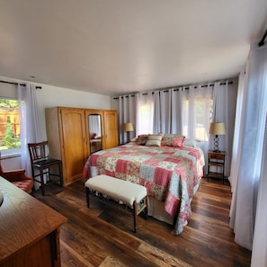 Master Bedroom - King bed with lakefront view.
