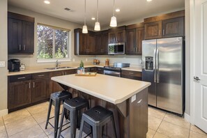 Kitchen Area with Appliances & Island in the middle