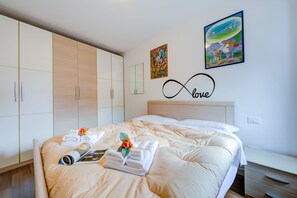 The bedroom with wardrobe