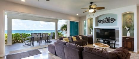 White Hibiscus Estate is a 4-bedroom home with incredible views.Views are what capture your eye in this full room view. Doors open to unobstructed views.