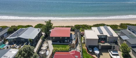 Front Bungalow with private walkway and stairs to the pristine Cremorne Beach.