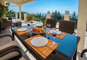 Embark on a culinary journey in the exterior dining area with picturesque view