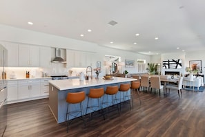 A sleek kitchen with a spacious island