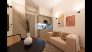 Living area comes with a cozy sofa, dining area for 2 and a a fully equipped kitchenette for your homecooked meals. #cooking #dining #airbnb