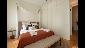 The bedroom comes with closet space and an AC unit for comfortable stays all year round. #AC #modern