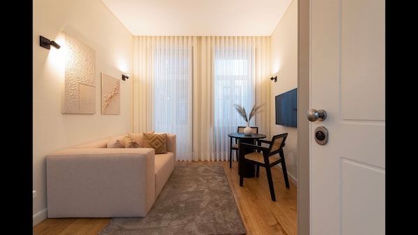 Beautifully decorated living room with high quality furniture and an AC unit for a comfortable stay all year round. #AC #comfort #airbnb