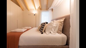 The bedroom comes with closet space and cozy linen. #cozy #sleep #lovelystay