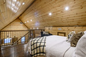 Loft bedroom with king bed. 