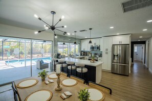 Modern dining area with plenty of seating space.