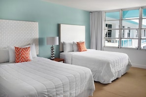 Bedroom with 2 Double beds. The exact unit will be assigned upon arrival. Views, colors, and decor may vary