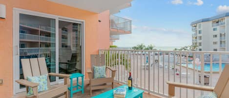 The balcony overlooks the pool and Gulf of Mexico. 