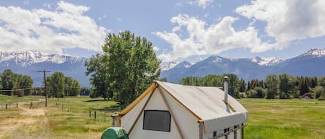 Wake up at the base of the Wallowa Mountains.