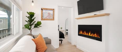 Living Room with Electric Fireplace & SmartTV