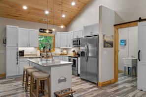 Elevate your culinary experience in the upgraded & well-stocked chef's kitchen!