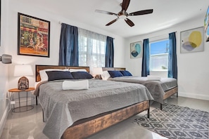 Bedroom two features lavish 2 queen beds