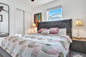The beautiful bedroom three also offers a luxuriously large king bed