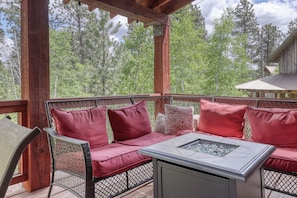 Outdoor patio seating with a fire table