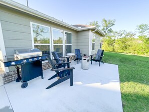 Back patio - 
Stainless steel propane grill. 
Fire pit and seating for 4. 