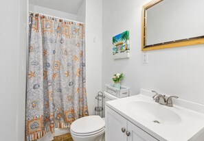 Updated full bathroom with fun, beachy decor