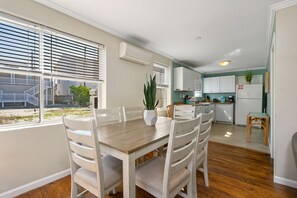 The living room flow right to the dining space and kitchen so everyone can be together and still spread out