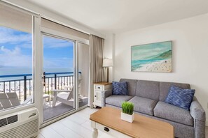 Wake up to postcard views and unwind with the sea breeze in your bright and beachy oceanfront living room—where the couch is comfy, the vibes are coastal, and the Atlantic is always center stage.