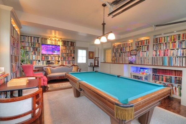 Library and Game Room, Bluetooth Stereo, Disco Ball, Pool, Darts, Shoot the Moon, Rock em Sock Em Robots, Chess and More!