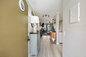 The door has a code-based lock system, so no need to check into our office for a key!