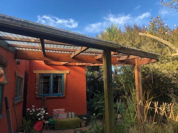 Sheltered sunny outdoor living off the kitchen 