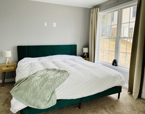 Master Bed with a view of the sunrise every morning 