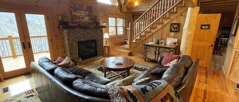 Great Room/Living Area w/Gas Fireplace & French Doors leading out onto top deck