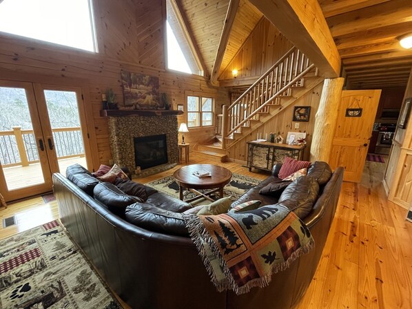 Great Room/Living Area w/Gas Fireplace & French Doors leading out onto top deck