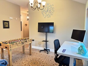 Electronic desk Height Adjustable desk with 27" curved monitor.
