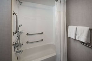 Full bathroom with a shower/tub. Basic toiletries and towels are provided.