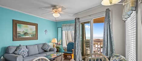 Open Dinning & Living Room With Deck Views