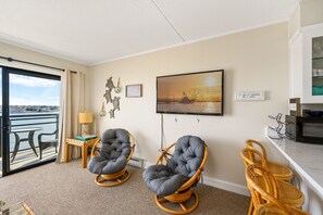 Relax in the AC and enjoy a movie on the Smart Flat Screen TV after a fun filled day in the sun