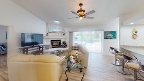 Living room with access to lanai / pool area