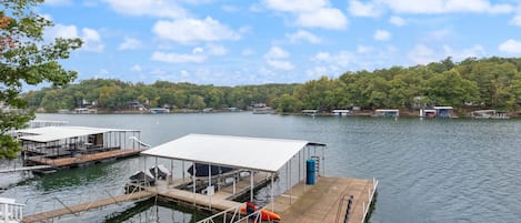 Dock life is where it's at! Enjoy the swim mat, kayak, and easy access swim ladders